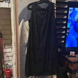 Black sleeveless dress by Tiana B this is definitely a dress to grab